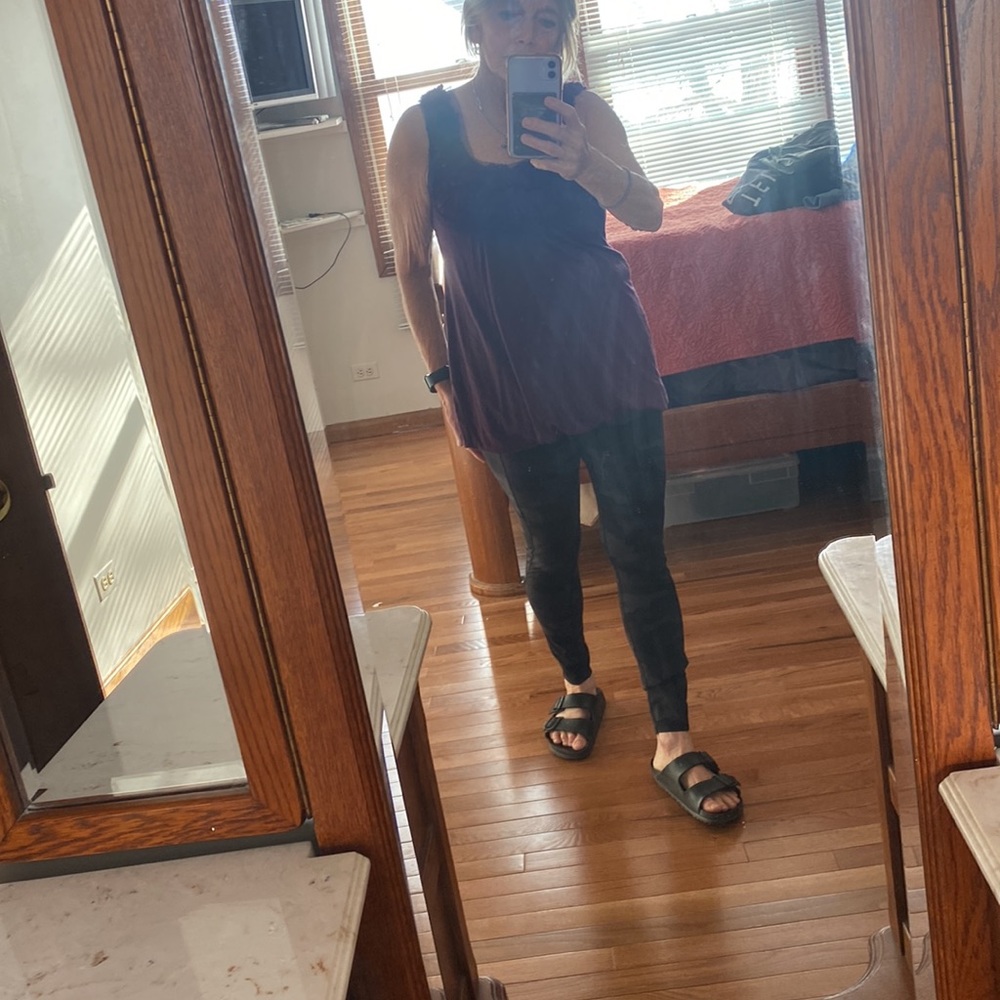 Burgundy dressy tank . It is blouson on the bottom. Fits long and cute